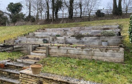 Oak Sleeper Planters with Dry Stone Walls in Cirencester