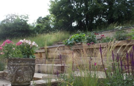 Oak Sleeper Planters with Dry Stone Walls in Cirencester